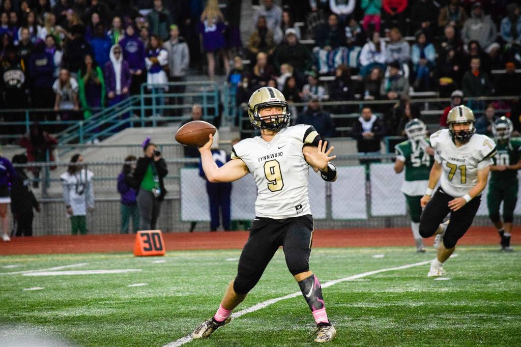 Senior quarterback Nate Killen throws to an open receiver against Edmonds-Woodway on Friday at Edmonds Stadium. (Katie Webber / The Herald)