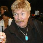 Comedian Rip Taylor talks with reporters before a film premiere in the Hollywood section of Los Angeles on Oct. 21, 2002. Taylor, the mustached comedian with a fondness for confetti-throwing who became a television game show mainstay in the 1970s, died Sunday. He was 88. (AP Photo/Rene Macura, File)