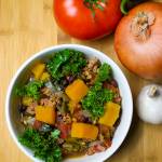 This butternut squash soup is made with kale, tomatoes, poblano peppers, chicken sausage, beans and wheat berries. (Andy Bronson / The Herald)