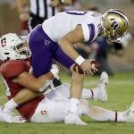 Washington quarterback Jacob Eason is sacked by Stanfords Scooter Harrington in the second half of the Huskies loss to Stanford on Saturday in Stanford, California. (AP Photo/Ben Margot)