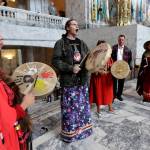 Earth Feather Sovereign (left) of the Confederated Tribes of the Colville Reservation, joins others in playing drums and signing in the Capitol Rotunda after Washington Gov. Jay Inslee signed a bill into law April 24 in Olympia. The bill creates liaison positions within the Washington State Patrol, and requires the agency to develop best practices in hopes of reducing disproportionate rates of violence faced by Native American and indigenous women, and also the frequency with which perpetrators of the crimes avoid justice. (AP Photo/Ted S. Warren)