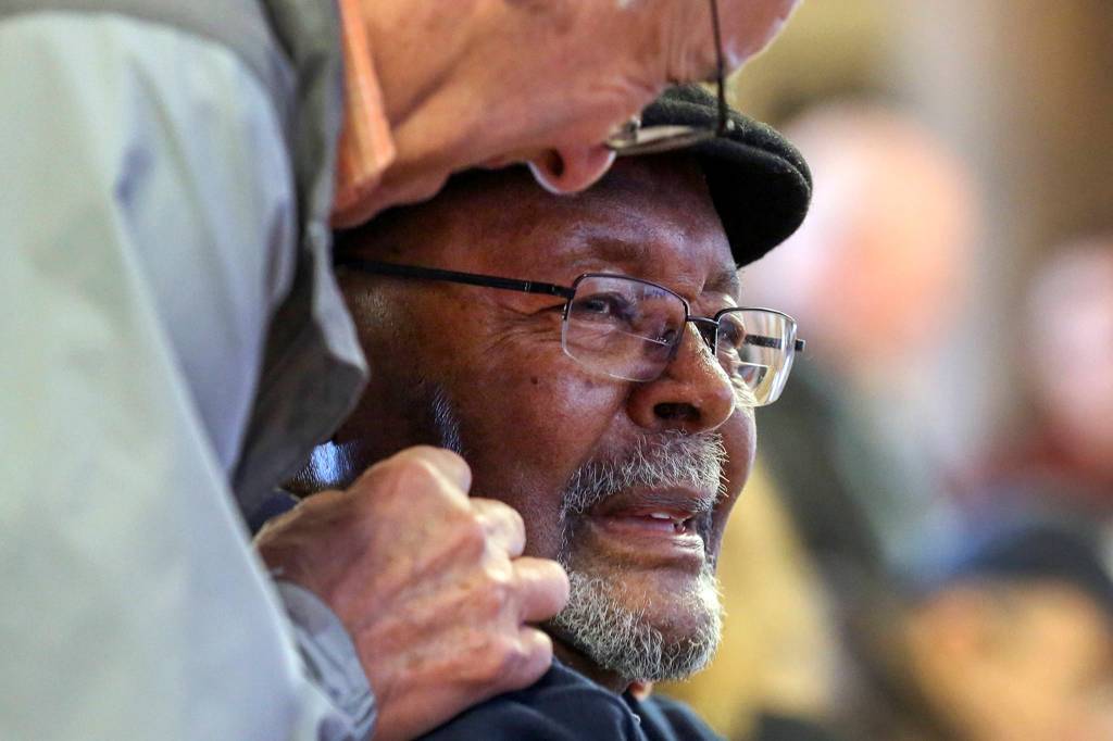 Carl Gipson with a guest of his birthday party Saturday afternoon at Carl Gipson Senior Center in Everett on January 12, 2019. (Kevin Clark / The Herald)
