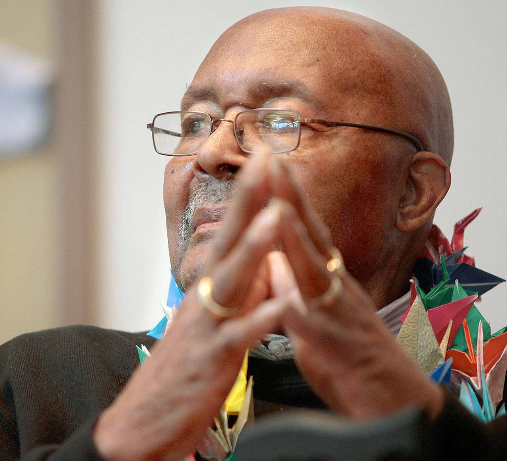 Carl Gipson listens to people thank him and wish him a happy 90th birthday Jan. 11, 2014, at the Carl Gipson Senior Center. (Annie Mulligan / Herald file)