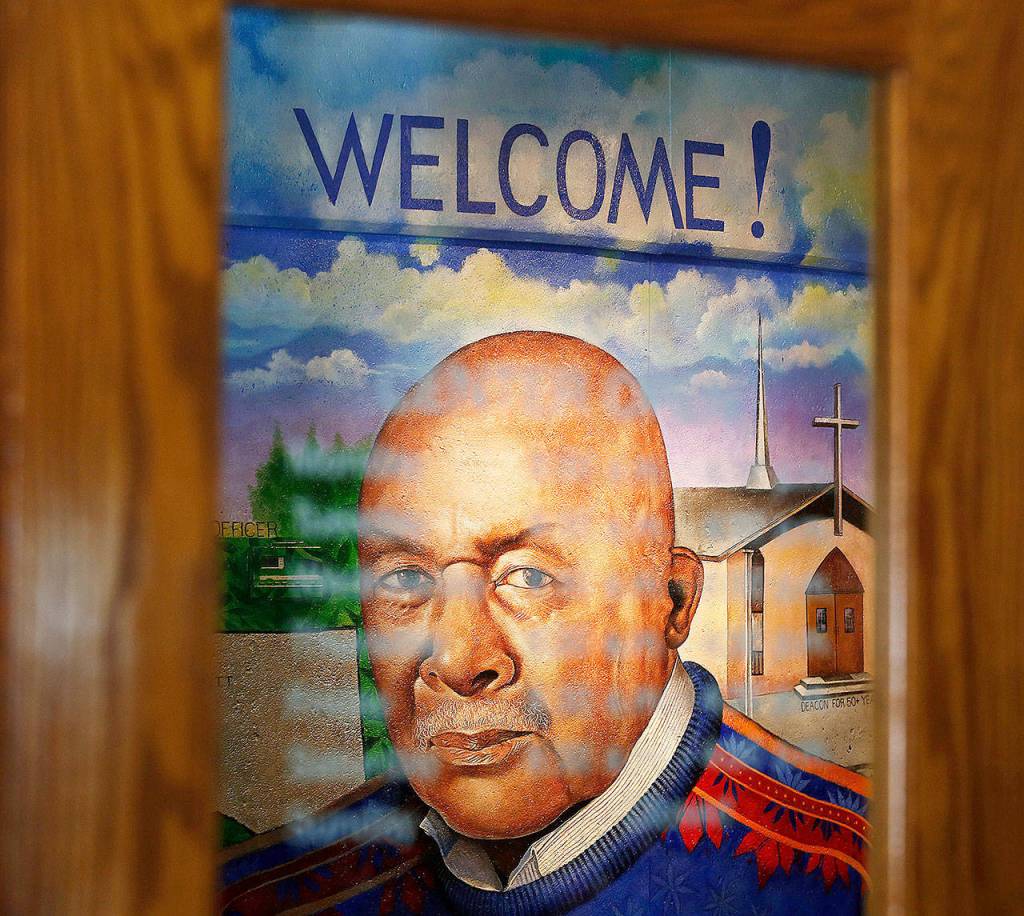 Artist Jesse James Jeter unveiled a mural of Carl Gipson on June 18, 2014, at the Carl Gipson Senior Center in Everett. (Mark Mulligan / Herald file)