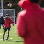 Everett Community Colleges Efren Martinez receives a pass from a teammate during the Trojans Oct. 8 practice at Kasch Park in Everett. (Olivia Vanni / The Herald)