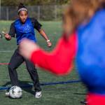 Everett Community Colleges Olivia Lee passes the ball during the Trojans Oct. 8 practice at Kasch Park in Everett. (Olivia Vanni / The Herald)