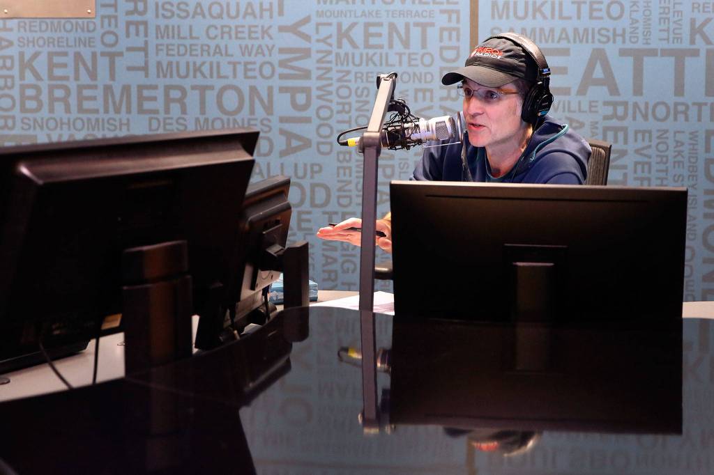 Local historian Feliks Banel, seen on the air with KIRO Radio, will talk about the Pacific Northwests infamous storms at two library events in Lynnwood and Marysville. (Kevin Clark / The Herald)