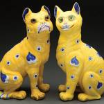 Emile Galle was a famous French artist who is best known for cameo glass vases. He also made important furniture and pottery that delights todays collectors. These faience figurines, a bulldog and a cat, sold at auction as a pair for $1,470. Every cat has a silly grin and glass eyes, so they are easy to recognize. (Cowles Syndicate Inc.)