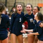 Arlington volleyball players celebrates a point during the Eagles 3-0 victory on the road at Snohomish on Thursday in a Wesco 3A/2A showdown between a pair of teams that came into the night undefeated. (Kevin Clark / The Herald)