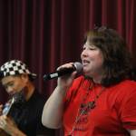 Music teacher Bobbie Ann George Bohemian Rhapsody with Jake Shimabukuro. (Andy Bronson / The Herald)