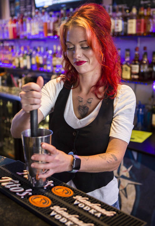 Bartender Amanda Bishop at The Clubhouse Bar and Grill on Wednesday, Oct. 16, 2019 in Everett, Wash. (Olivia Vanni / The Herald)