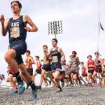 More than 300 runners competed in each of the four varsity races Saturday afternoon during the 36th annual Hole in the Wall Invitational at Lakewood High School. (Kevin Clark / The Herald)