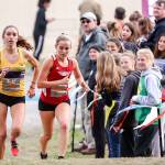 Kings senior Naomi Smith (right) and Issaquah junior Julia David-Smith own the top two girls times in the entire state this season. (Kevin Clark / The Herald)