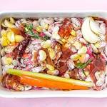 A baking dish of braised lima beans before heading into the oven. (Mariah Tauger / Los Angeles Times)