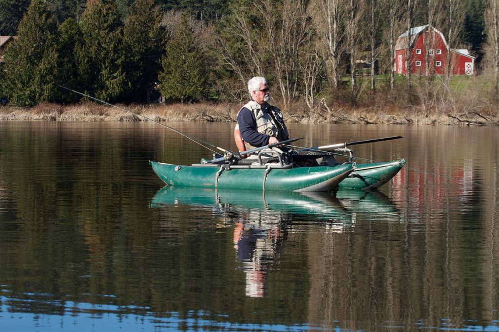 Dick Snow of Marysville searches for fish on Lone Lake. (Mike Benbow photo)