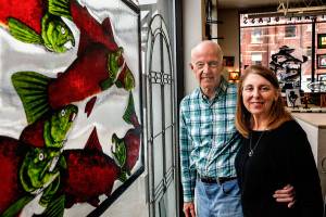 Covenant Art Glass owners Stan and Colleen Price plan to retire at years end after being in business since 1979. Stan Prices glass pieces will be on sale in November at their Everett shop. (Dan Bates / The Herald)