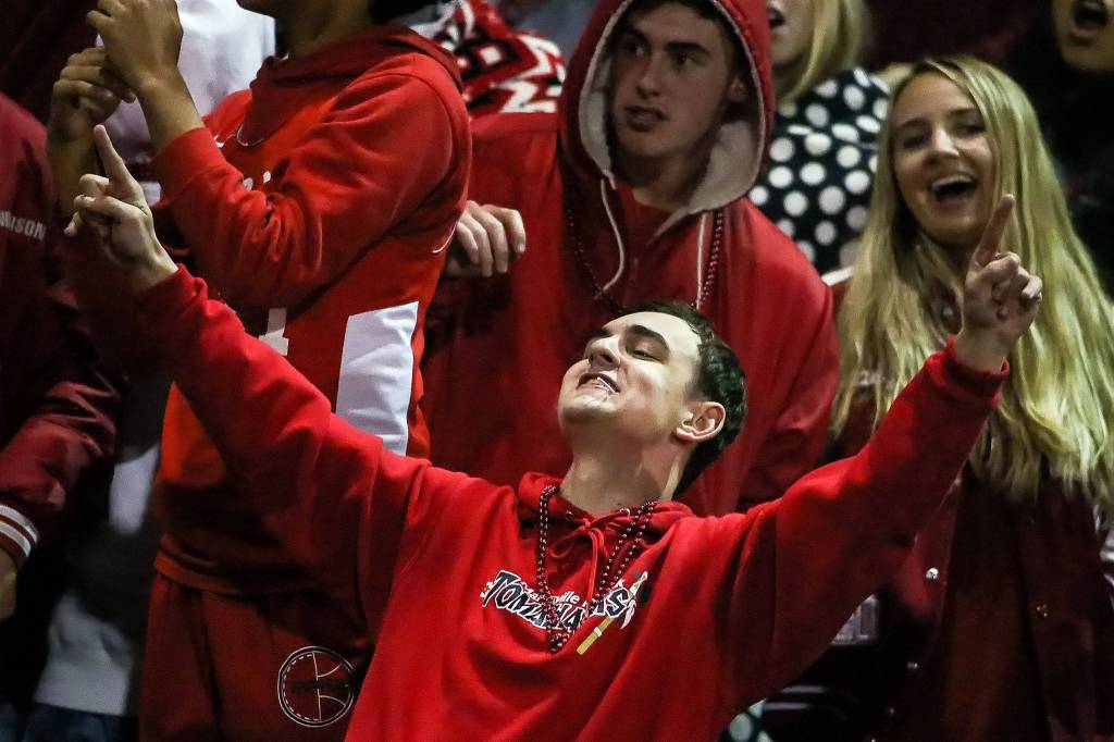 Fans cheer for the Tomahawks in their victory over Ferndale on Friday night at Quil Ceda Stadium in Marysville. (Kevin Clark / The Herald)