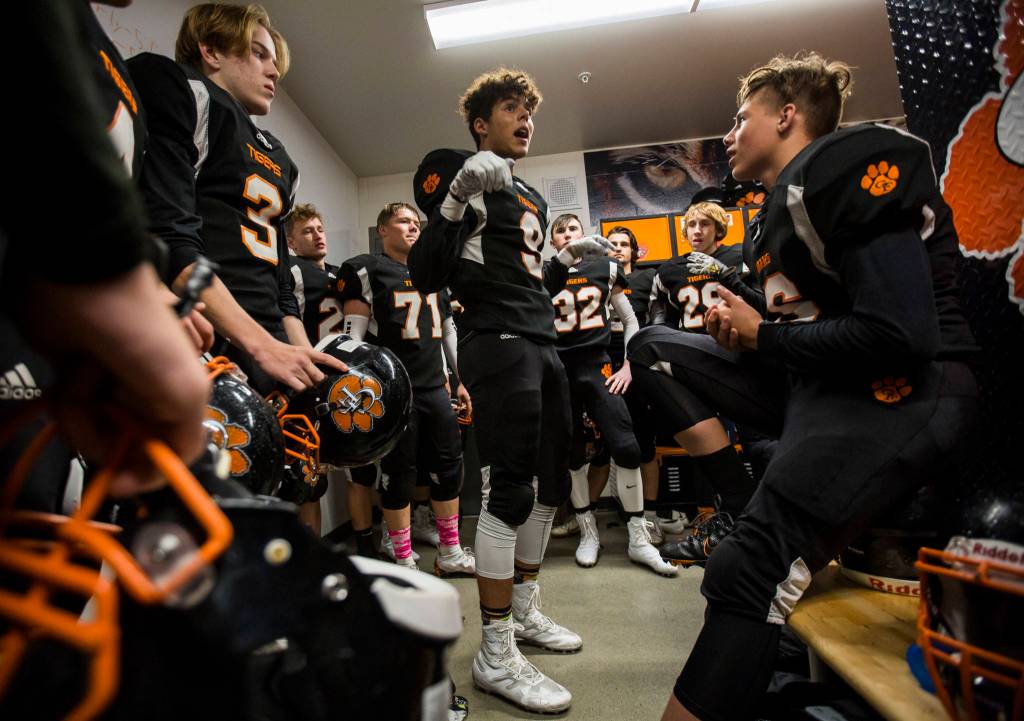Granite Falls Mason McBride talks to his teammates before a game on Friday in Granite Falls. (Olivia Vanni / The Herald)