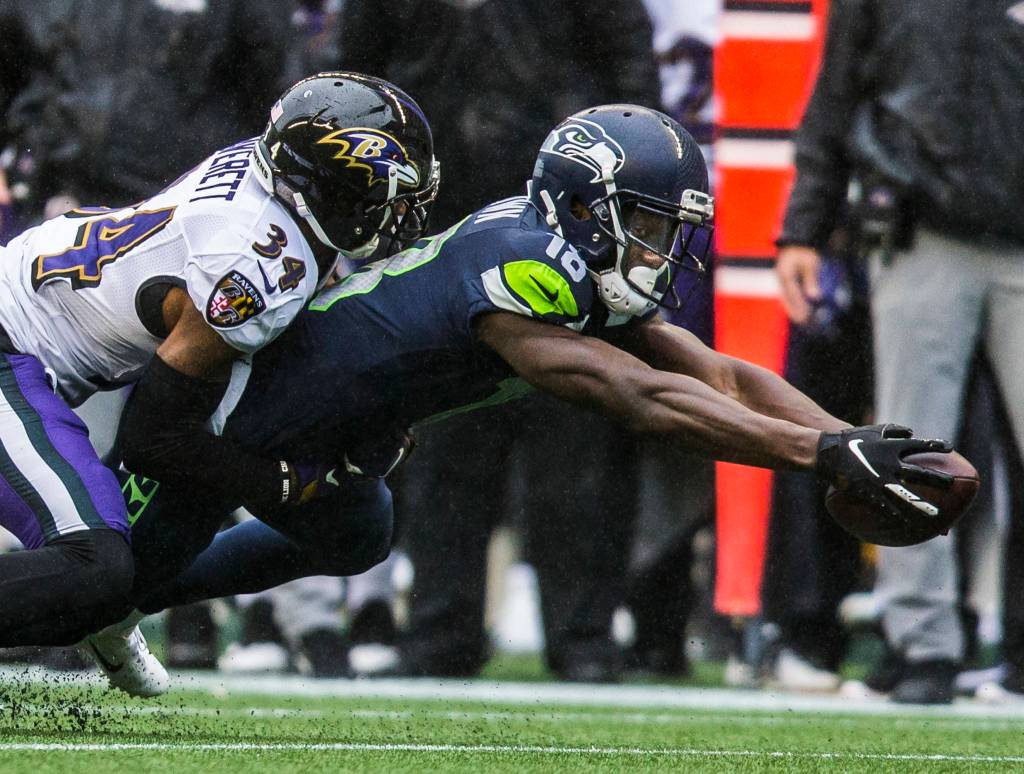 Seattle Seahawks Jaron Brown reaches out his arms for a first down during the game against the Baltimore Ravens on Sunday, Oct. 20, 2019 in Seattle, Wash. (Olivia Vanni / The Herald)