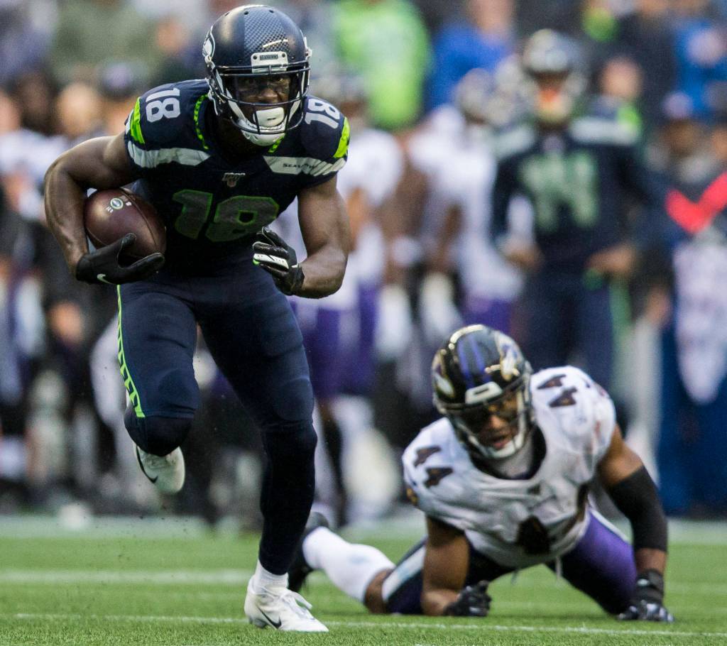 Seattle Seahawks Jaron Brown runs past Baltimore RavensՠMarlon Humphrey during the game against the Baltimore Ravens on Sunday, Oct. 20, 2019 in Seattle, Wash. (Olivia Vanni / The Herald)