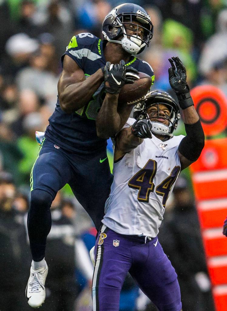 Seattle Seahawks Jaron Brown jump above Baltimore Ravens Marlon Humphrey to make a catch during the game against the Baltimore Ravens on Sunday, Oct. 20, 2019 in Seattle, Wash. (Olivia Vanni / The Herald)