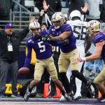 Washington Huskies Andre Baccellia celebrates after scoring a touchdown during the game against Oregon on Saturday, Oct. 19, 2019 in Seattle, Wash. (Olivia Vanni / The Herald)