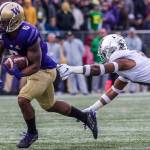 Washington Huskies Chico McClatcher escapes a tackle during the game against Oregon on Saturday, Oct. 19, 2019 in Seattle, Wash. (Olivia Vanni / The Herald)