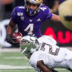 Washington Huskies Terrell Bynum is tackled by Oregon Ducks Mykael Wright during the game against Oregon on Saturday, Oct. 19, 2019 in Seattle, Wash. (Olivia Vanni / The Herald)