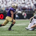 Washington Huskies linebacker Daniel Heimuli yells after blocking a pass during the game against Oregon on Saturday, Oct. 19, 2019 in Seattle, Wash. (Olivia Vanni / The Herald)