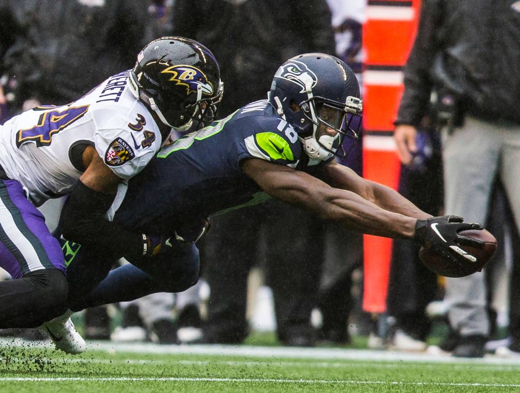Seattle Seahawks Jaron Brown reaches out his arms for a first down during the game against the Baltimore Ravens on Sunday, Oct. 20, 2019 in Seattle, Wash. (Olivia Vanni / The Herald)