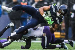 Seattle Seahawks C.J. Prosise is tackled during the game against the Baltimore Ravens on Sunday, Oct. 20, 2019 in Seattle, Wash. (Olivia Vanni / The Herald)