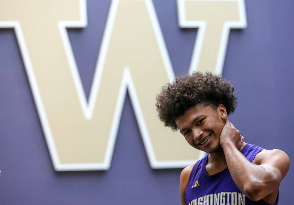 Washington freshman and Marysville Pilchuck alum RaeQuan Battle smiles after an interview Tuesday afternoon at Alaska Airlines Arena in Seattle. (Kevin Clark / The Herald)