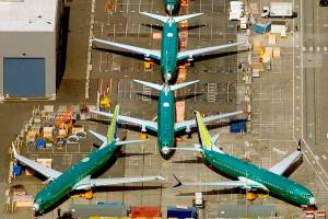 737 costs soar, and Boeing plans to slow production of 787s