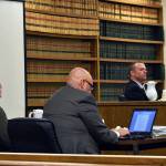 Defendant Anthony Garver (left) sits beside his attorney, Jon Scott, as they listen to questioning of sheriffs detective Brad Walvatne on Thursday, during Garvers murder trial in Snohomish County Superior Court. (Caleb Hutton / The Herald)