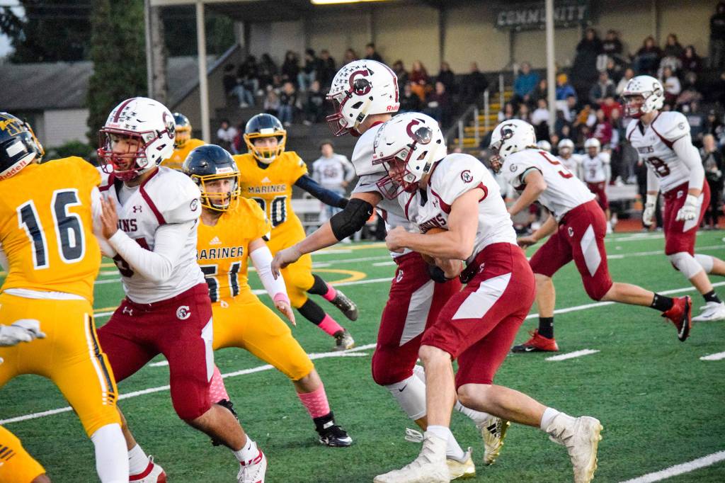 Senior running back Kolby Wilson-Kirkpatrick returns the ball for Cascade against Mariner on Friday, Oct. 25 at Goddard Stadium in Everett. (Katie Webber / The Herald)