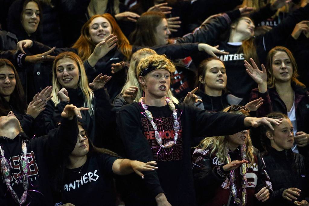 Snohomish fans cheer Friday evening at Veterans Memorial Stadium in Snohomish on October 25, 2019. (Kevin Clark / The Herald)