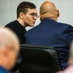 Anthony Garver talks with his attorney as the judge reads his remarks before the verdict at the Snohomish County Courthouse on Tuesday in Everett. (Olivia Vanni / The Herald)