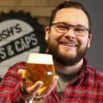 Blake Fitzgerald is a certified cicerone at Joshs Taps & Caps in Snohomish. (Kevin Clark / The Herald)