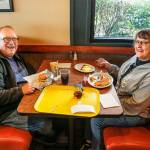 Its easy to see why Tom and Carol Lee of Marysville have been regular customers the last 10 years at Everetts Burgermaster. For breakfast, she likes scrambled eggs and waffles. He likes a hamburger, fries and a soda. The restaurant is closing Sunday. (Dan Bates / The Herald)