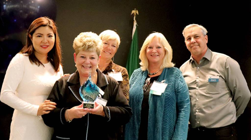 Edmonds Community College Trustee Emily Yim and former Foundation Board officers Ruth Arista, Jean Sittauer, and current board member Douglas Fair with Cornerstone Award recipient Diana Clay on Oct. 24. (Edmonds Community College)