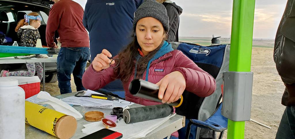 Club president Trixie Teng works on her Level II rocket. (Edmonds Community College)