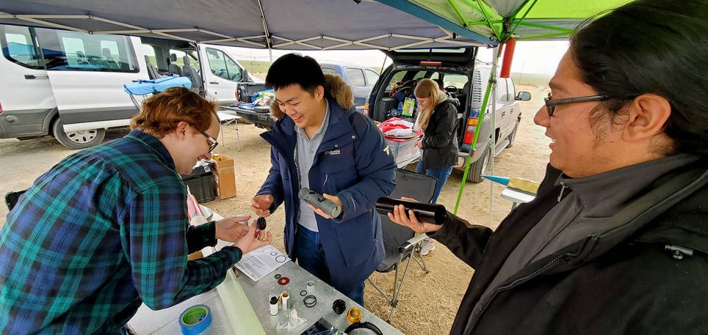 Edmonds CC Rocketry Society members prepare their rockets for launch. (Edmonds Community College)
