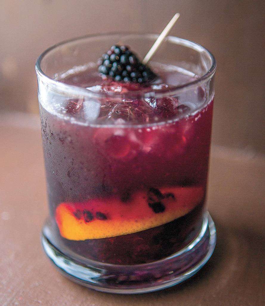 Whidbey Island Distillerys Blackberry Bunker Old Fashioned is made with Whidbey Island Distillery Bunker Rye Whiskey, Whidbey Island Blackberry Liqueur, Angostura Bitters and soda water. (Olivia Vanni / The Herald)