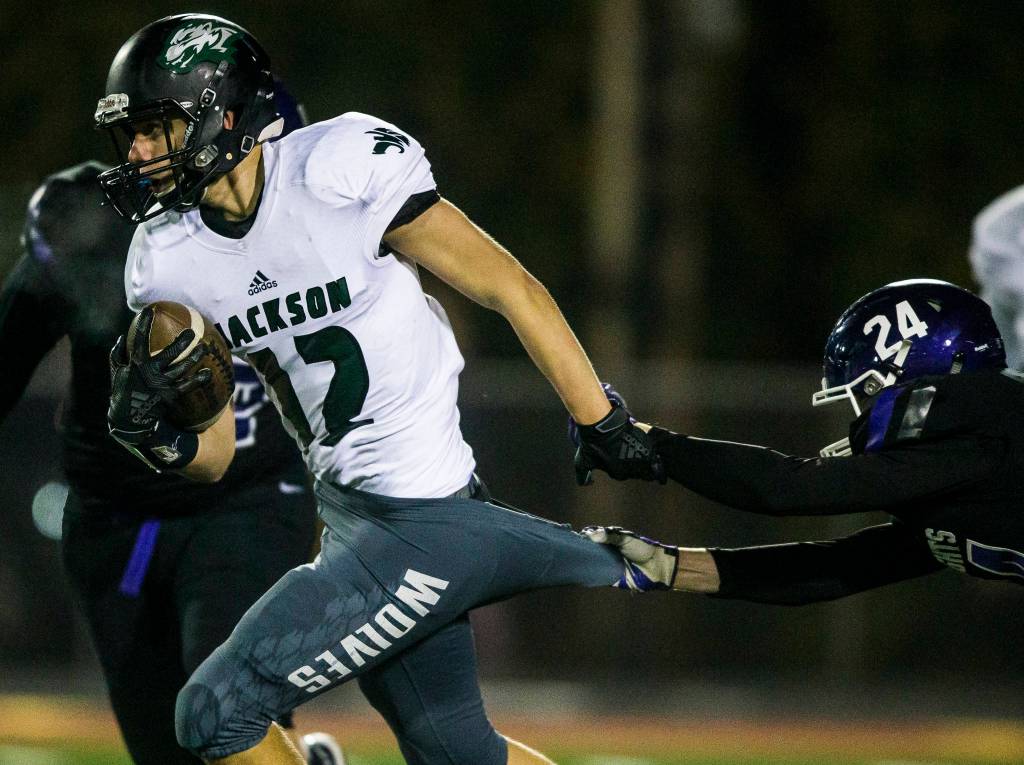 Jacksons Luke Marklund has his pants pulled by Kamiaks Nolan Martin during the game on Nov. 1, 2019 in Everett, Wash. (Olivia Vanni / The Herald)