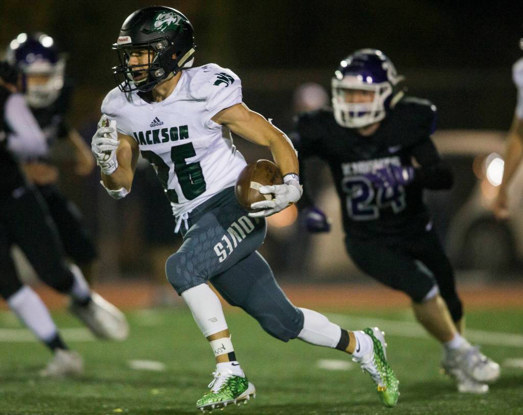 Jacksons Brendan Sandico runs the ball during the game on Nov. 1, 2019 in Everett, Wash. (Olivia Vanni / The Herald)