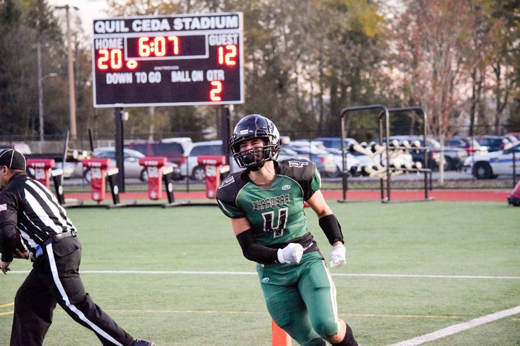 Junior wide receiver Landyn Olson celebrates after scoring a touchdown for Getchell against Lynnwood on Friday, Nov. 1 at Quil Ceda Stadium in Marysville. (Katie Webber / The Herald)