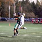 Junior wide receiver Landyn Olson (left) catches a first down for Getchell against Lynnwood on Friday, Nov. 1 at Quil Ceda Stadium in Marysville. (Katie Webber / The Herald)