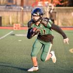 Junior wide receiver Nolan Maurer returns the ball for Marysville Getchell against Lynnwood on Friday, Nov. 1 at Quil Ceda Stadium in Marysville. (Katie Webber / The Herald)