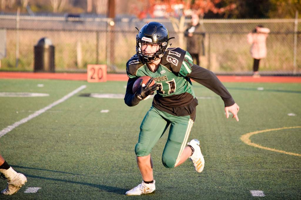 Junior wide receiver Nolan Maurer returns the ball for Marysville Getchell against Lynnwood on Friday, Nov. 1 at Quil Ceda Stadium in Marysville. (Katie Webber / The Herald)