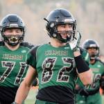 Senior defensive end Dominic Andrews smiles after recovering a fumble for a defensive touchdown against Lynnwood on Friday, Nov. 1 at Quil Ceda Stadium in Marysville. (Katie Webber / The Herald)